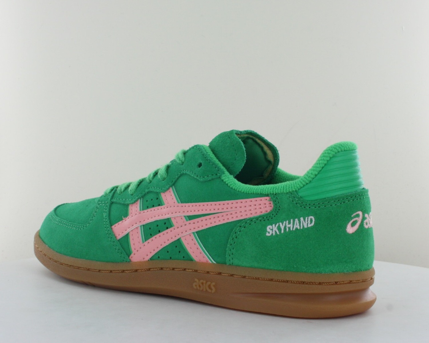 Asics Skyhand Vert rose gomme